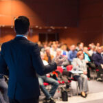 Speaker at Business Conference and Presentation. Audience at the conference hall.